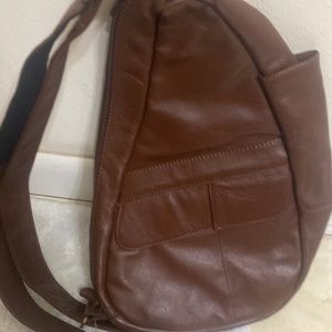 Healthy back bag , brown leather, great for everyday use brand new